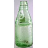 LONDON SPLIT SIZE DUMPY CODD BOTTLE. 6.5ins tall, aqua glass, embossed ‘T. BREWSTER GREAT SUFFOLK