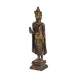 A Cambodian gilt bronze figure of Buddha