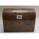 A parquetry inlaid walnut dome top box,