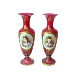 A pair of Victorian cranberry glass and