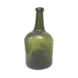 An English glass sealed wine bottle, cir