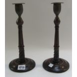 A pair of George III mahogany candlestic