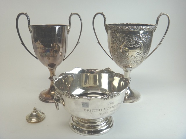 Three silver plated trophies;  The N.C.R