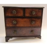 A 19th century miniature mahogany chest