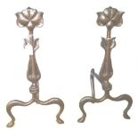 A pair of Art Nouveau copper alloy andir