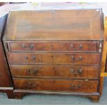 A George III mahogany bureau, the fall o