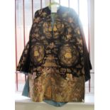 A Chinese black ground silk jacket, 20th