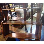 A 19th century oak three tier wall shelf