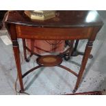 A reproduction drop leaf table and a sma