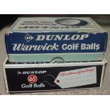 A box of six Dunlop Warwick golf balls a