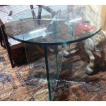 A 20th century glass table, the circular