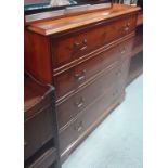 A 20th century yew chest of four long dr