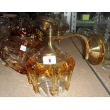 A group of brass wall lights with glass