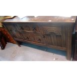 A 20th century oak sideboard.