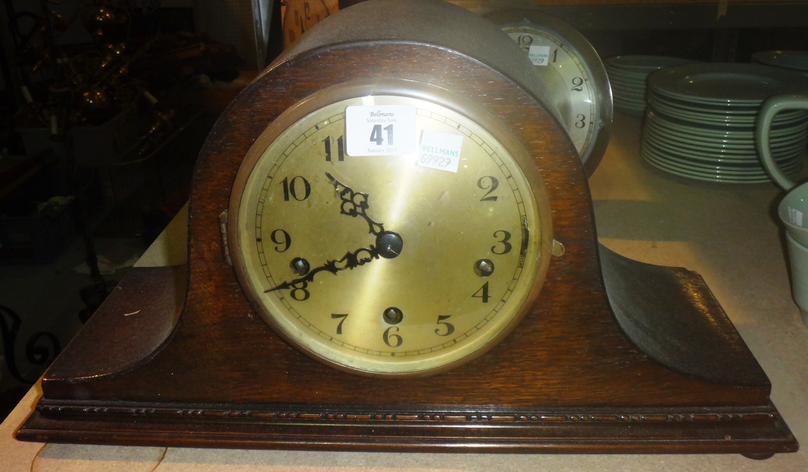 A group of four clocks including an Art