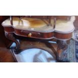 A 19th century walnut dressing table, wi