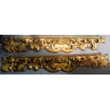 A pair of gilt acanthus carved pelmets.