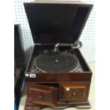 A 20th century mahogany cased lift top g