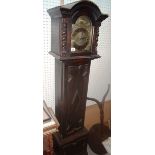 A 20th century oak longcase clock with e