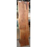 A large naturalistic slab of olive wood.