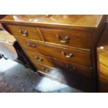 An Edwardian mahogany chest of drawers.