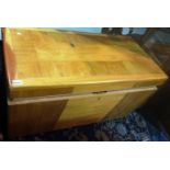 A 20th century walnut blanket box.