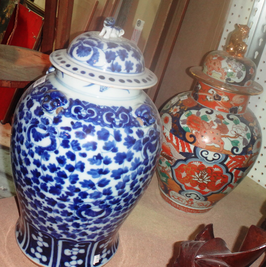 An Oriental blue and white baluster vase