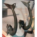 Two bronze fish sculptures and two storm