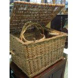 A large wicker basket, a small pine stoo