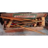 A quantity of croquet equipment, mallets