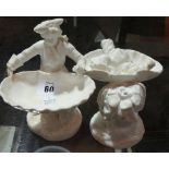 A pair of Minton white glaze figural swe