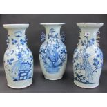 A pair of Chinese porcelain celadon-grou