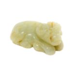 A Chinese pale green jade buffalo, 18th/