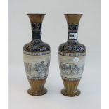 A pair of Doulton stoneware vases by Han