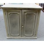 A grey painted two door low cupboard on plinth base, 92cm wide.