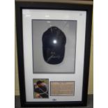 Sporting memorabilia; Tiger Woods, a signed cap, mounted, framed and glazed, with certificate of