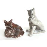A Royal Copenhagen porcelain fox and cubs, model No 1788 and a Royal Copenhagen wild cat, model No