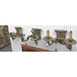 A set of three bronze two branch wall lights of Victorian Gothic style, early 20th century, the