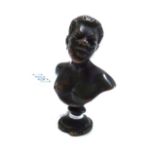 A miniature bronze bust, early 19th century, modelled and cast as an African male on socle, 5.8cm