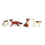 Five Beswick hounds (one a.f) and two Beswick foxes (7).