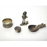 Silver, comprising; a model of a standing chimney sweep, London 1978, a tea caddy spoon, the handle