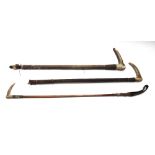 Nine horn mounted riding crops and several leather straps, (a.f), (qty).