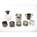 Silver and silver mounted wares, comprising; a pair of napkin rings, with pierced decoration,