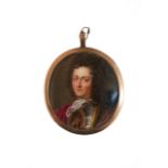 A gold mounted oval ceramic portrait miniature, decorated with the portrait of a gentleman wearing