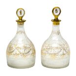 A pair of Continental glass decanters and stoppers, probably French, early 19th century, each of