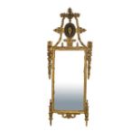 A late 18th century Italian gilt framed wall mirror with classical medallion over rectangular