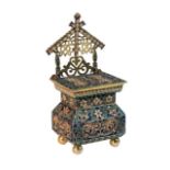 A silver gilt and enamel salt throne, incorporating a box to the base, decorated in blue, red,