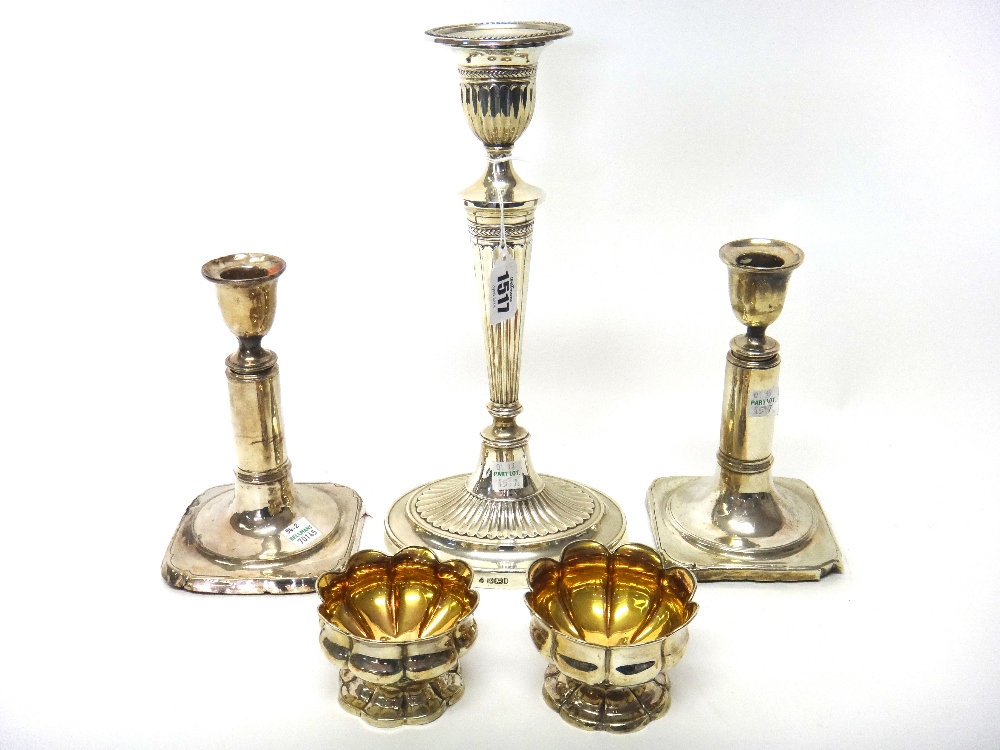 A silver table candlestick, of Adam style, with partly fluted decoration in the neo-classical