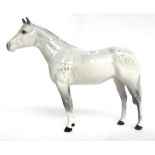 Five Beswick horses; two dapple grey colour, the other three brown gloss, black printed marks, 20.