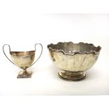 Silver, comprising; a small rose bowl, with a shaped rim, on a circular foot, London 1905 and a
